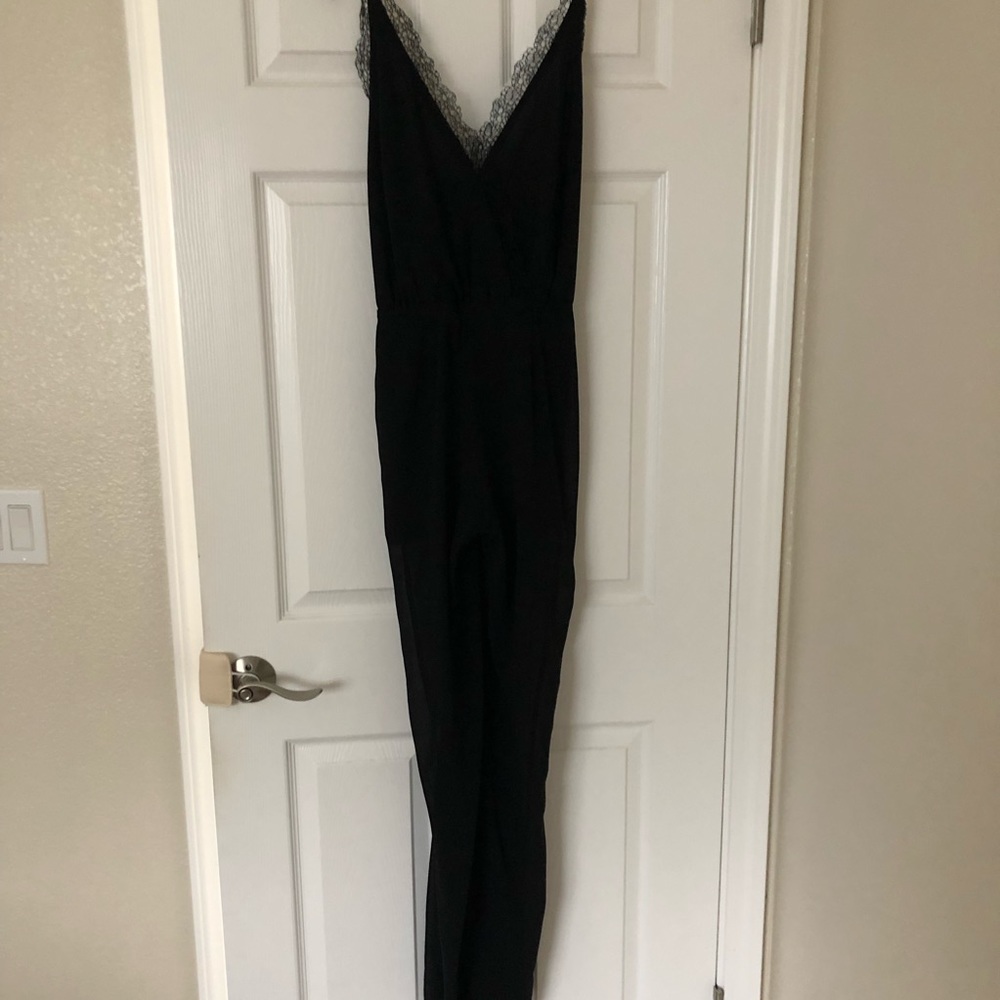 Black lace jumpsuit with low and bare back